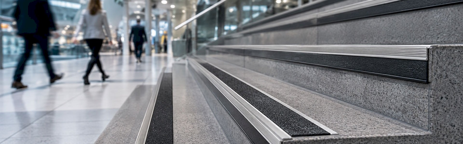 Durable stair nosing improving grip and stair edge visibility in a busy workplace