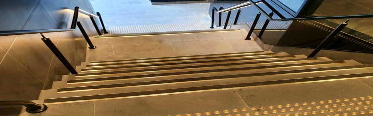 Modern building entrance with durable external stair nosing installed for safety