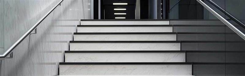 Office staircase transformation featuring PVC hard nosing for improved safety and design