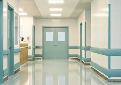 Wall corner protectors installed in a modern office interior