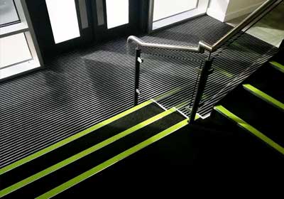 Close-up of stair nosing installed on modern office stairs for safety